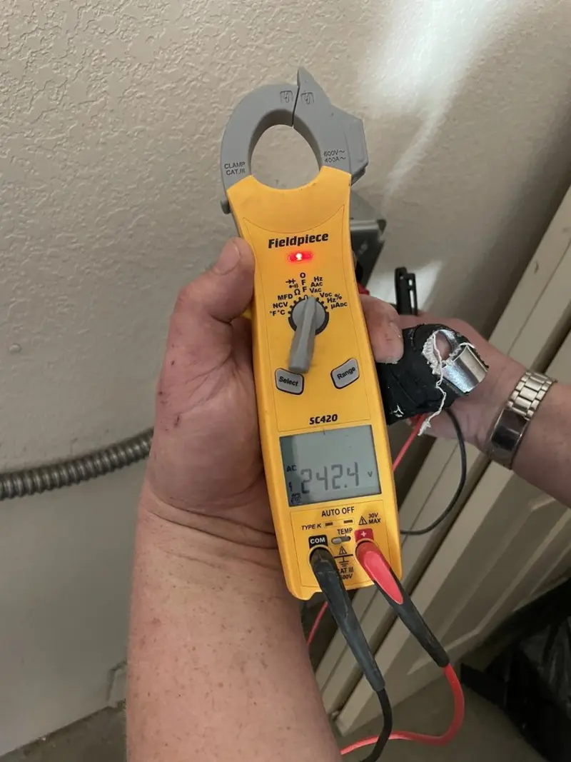 Voltage testing with clamp meter during Hot Tub / Pool Electrical Wiring in Turtle Creek